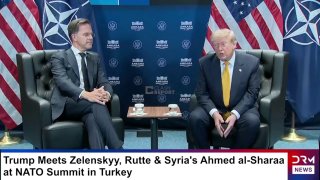 Дональд Трамп и флаг Испании на фоне здания правительства в Мадриде