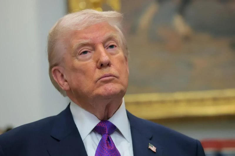 Дональд Трамп во время телеобращения 16 июля, на фоне карты США
